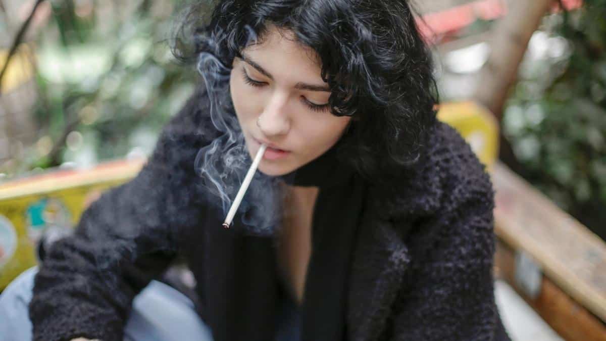 A girl addicted to smoking.