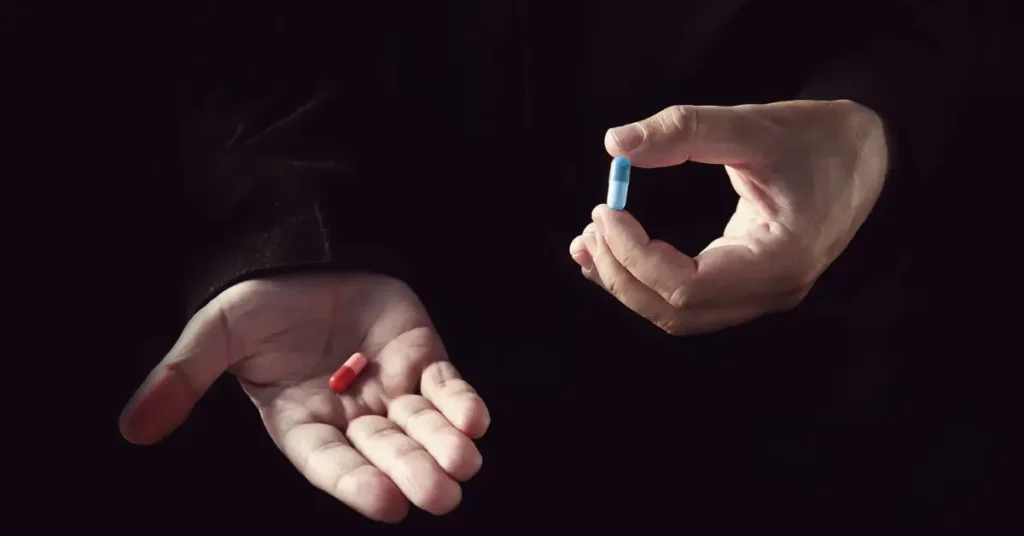 Person holding pills