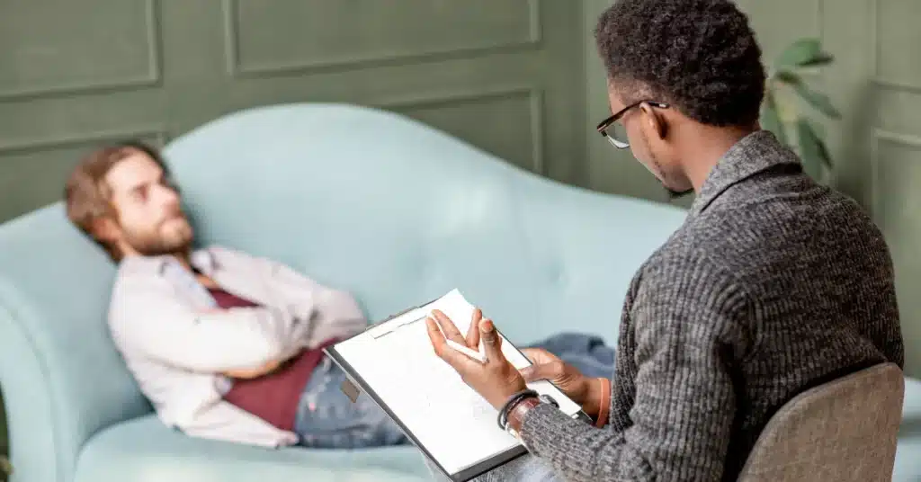 man taking therapy session