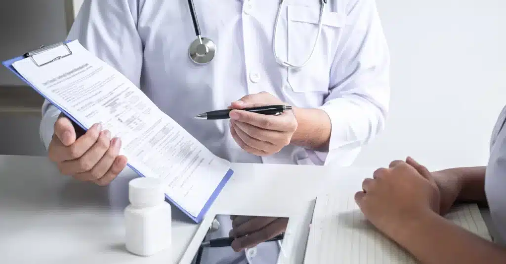 Doctor consulting patient