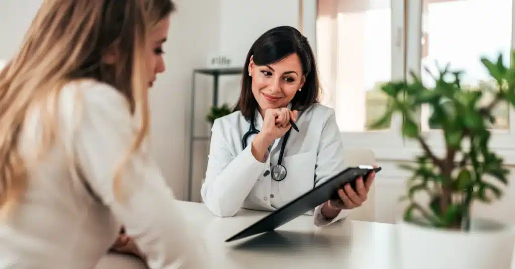 Woman consulting Doctor
