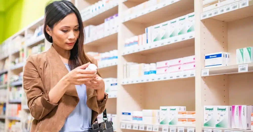 woman checking medicines