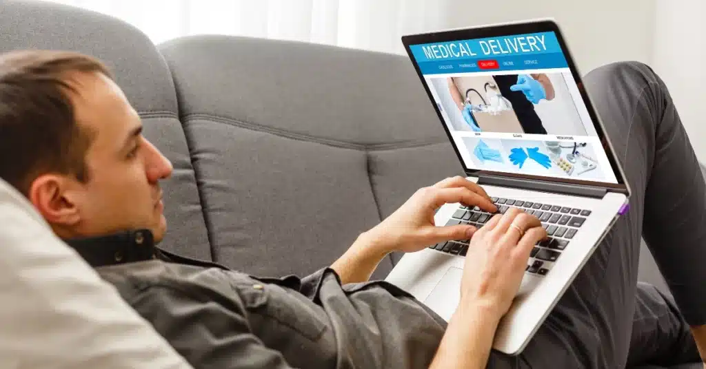 man searching for online pharmacies
