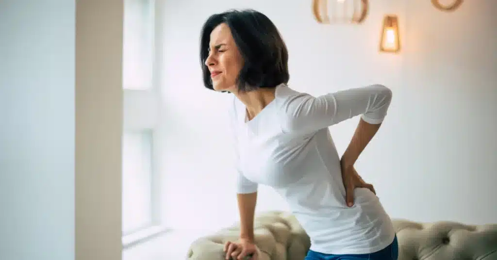 woman suffering from pid pain in lower back