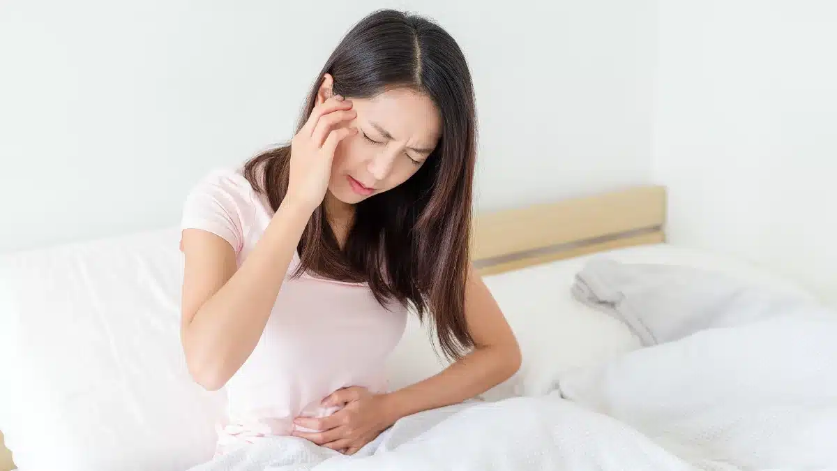 period symptoms vs pregnancy symptoms