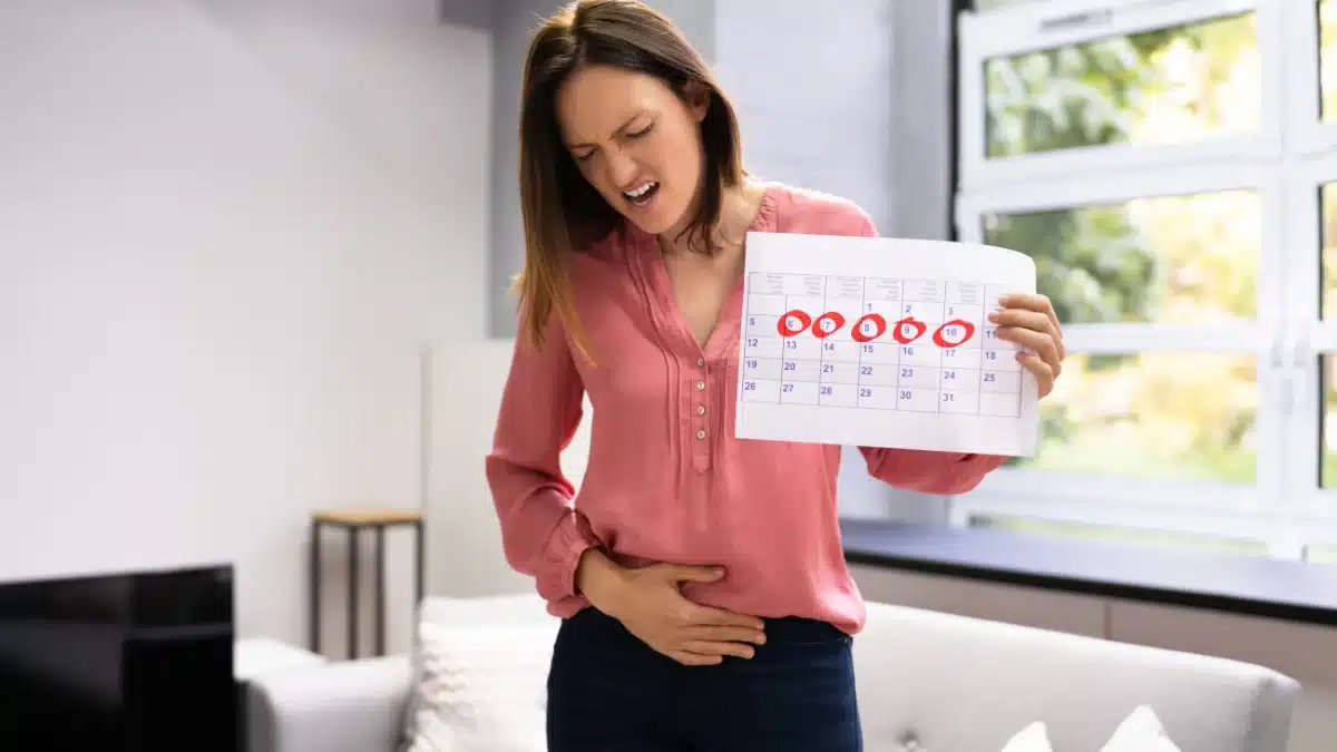 what causes a woman to menstruate twice in a month