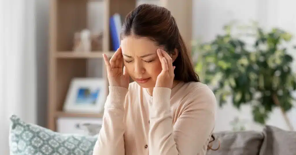 Woman suffering from headache