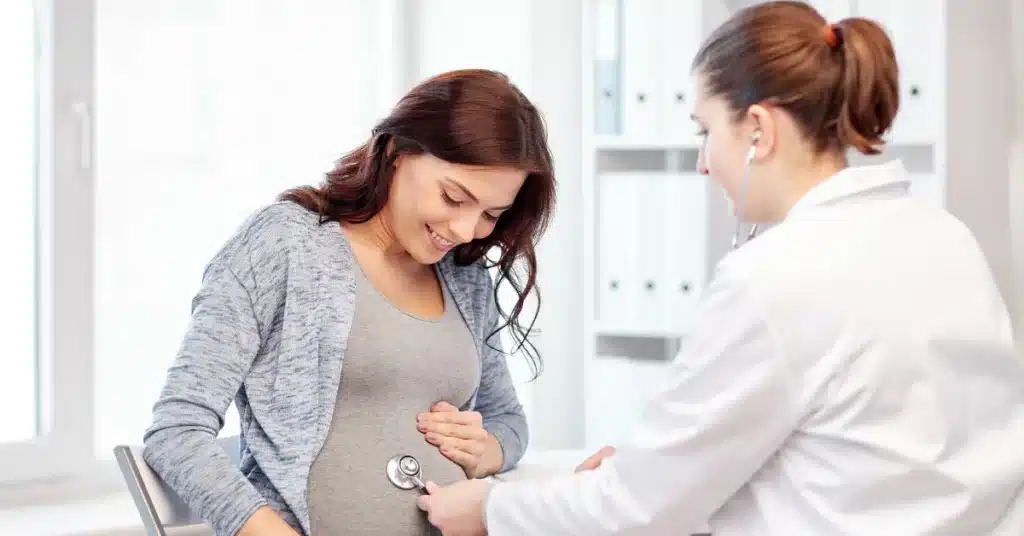 Doctor checking the health of pregnant woman