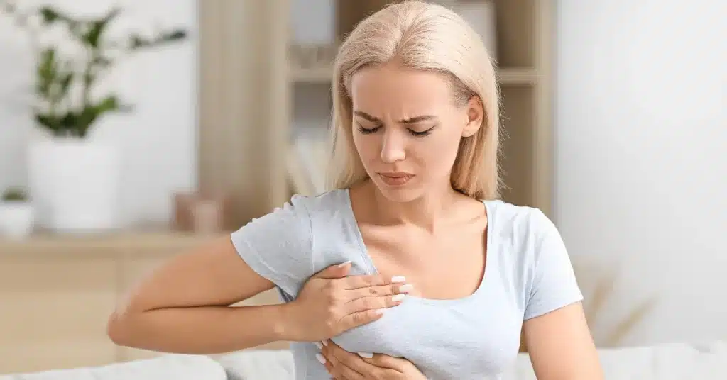 Woman suffering breast pain