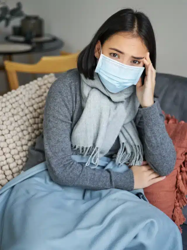 covid-health-concept-young-asian-woman-medical-face-mask-feels-sick-unwell-catching-flu-p